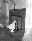 Boy looking up a chimney